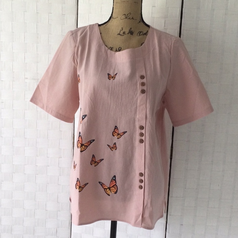 Woman’s Pullover Blouse made in China Size 1X color pink butterfly design  #503